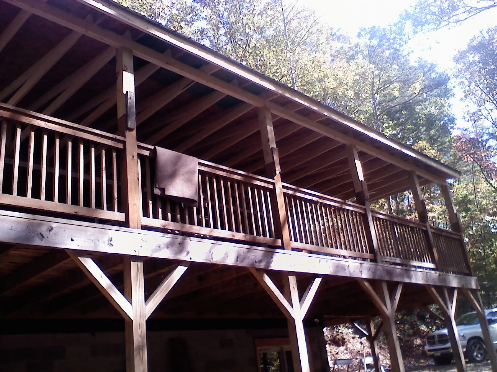 Timber framing under a new elevated porch and deck — Roof Leak Repair in Bussey by Roofing Brothers